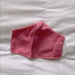 Norwex adult pink face mask.